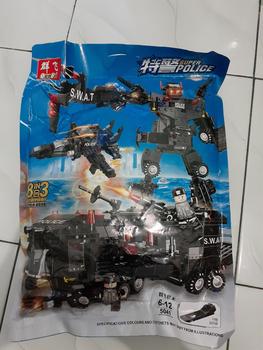 Product Review of ISI 500PCS  SWAT Block Black Hawk Building TenTara Pesawat City Kota Brick Robot Polisi Truck from M** 0