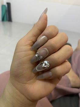 Product Review of Mã D006 - Nailbox Thiết Kế Thủ Công French Mắt Mèo (kèm bộ dụng cụ). from T**1 1