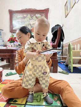 Product Review of Bộ polo phối viền nâu và đen- kẻ caro  cổ bẻ 8-19ký from M**h K**i 0