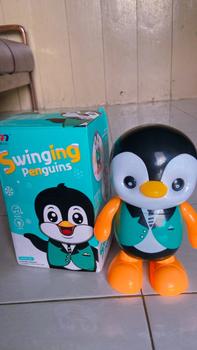 Product Review of Mainan Anak Robot Pinguin Dancing Music Lighting - Mainan Dance Robot Pinguin from m**8 1