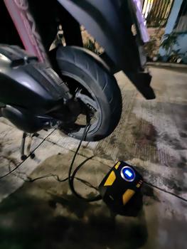 Product Review of The Car Tire Inflator Pump Is Made Of Durable ABS Plastic And Stainless Steel With LCD Display For Accuracy And High Brightness LED Lights To Provide Illumination At Night Automatic Off Easy To Use Hands-Free Design Will Free Hands When Inflating Car Tire from R**e 2