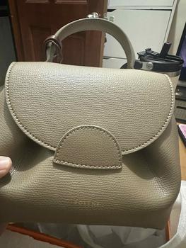 Product Review of Cowhide pole*e style lady full grain sling bag hand bag from L**X R**3 0