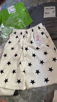 Product Review of Bộ quần áo màu trắng- áo hai tia sét + quần hoạ tiết ngôi sao HT: 29 Menswear Nam from T** l** N**m 2