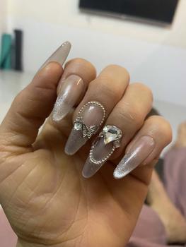 Product Review of Mã D006 - Nailbox Thiết Kế Thủ Công French Mắt Mèo (kèm bộ dụng cụ). from T**1 0