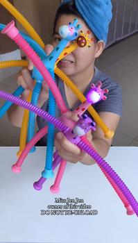 Product Review of Niko Stretch Tube Giraffe Puzzle Toy Giraffe Pop Tubes Toy Cartoon Suction Cup Toy Decompression Toy from M**s J** J** 2