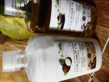 Product Review of เซทน้ำมันคู่หู : น้ำมันมะพร้าวสกัดเย็น+น้ำมันงาดำสกัดเย็น ขนาด1ลิตร - คัดสรรโดยอ.เอก from D**) 0