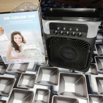 Product Review of USB portable  Automatic desktop fan humidifying ice water spray 600ml large water tank powerful electric fan home office dormitory multi-purpose air cooler Mobile Adjustable Detachable Spiral Blades from k**h p**x 0