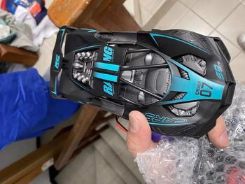 Product Review of [Giảm Sốc] Siêu Xe Điều Khiển Từ Xa Pin Sạc Bugatti Tỉ Lệ 1:20 Siêu Ngầu from H**h T**o 1