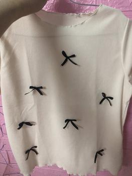Product Review of Áo thun nữ baby tee đính nơ sang chảnh hottrend 2024 new best seller vải thun tăm co dãn bốn chiều dày dặn. Top from U**n T**g 2