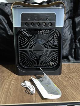 Product Review of USB portable  Automatic desktop fan humidifying ice water spray 600ml large water tank powerful electric fan home office dormitory multi-purpose air cooler Mobile Adjustable Detachable Spiral Blades from C**y M** T**o 0