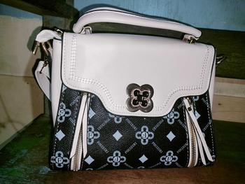 Product Review of Tas Selempang Wanita NewArrival Mini Slimbag Korea Style Kulit WS - CN 04 from J**🩶 0