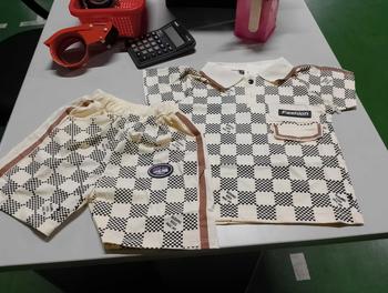 Product Review of Bộ polo phối viền nâu và đen- kẻ caro  cổ bẻ 8-19ký from k**n 0