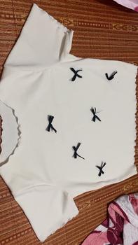 Product Review of Áo thun nữ baby tee đính nơ sang chảnh hottrend 2024 new best seller vải thun tăm co dãn bốn chiều dày dặn. Top from S**n 1