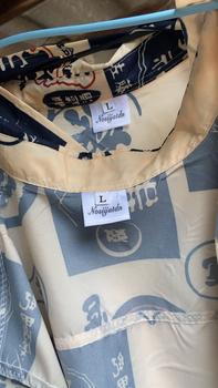 Product Review of เสื้อเชิ้ตแขนสั้นสำหรับผู้ชาย ทรงหลวม สไตล์วินเทจ พิมพ์ลายคำนำโชค คอปก ป้าย เหมาะสำหรับชายหาด เยาวชน และวัยรุ่น Unisex เสื้อฮาวาย from S**n S**n 0