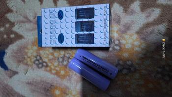 Product Review of ( with 2pcs free battery ) Dual slot battery charger with free 2pcs 18650 3.7v rechargeable battery from D**e 0