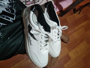 Product Review of New casual shoes feather men's sneakers trend breathable men's smell white shoes from J**a L**o 0