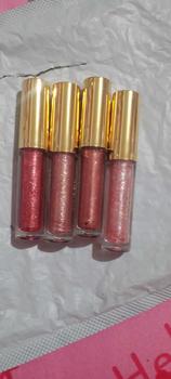 Product Review of ลิปกลอสกลิตเตอร์ กันน้ำ มี 5 สีให้เลือก กระจกติดทนนาน ให้ความชุ่มชื้น ลิปสติกอวบอิ่ม ประกาย เครื่องสำอางแต่งหน้า from ท**า เ**์ 1