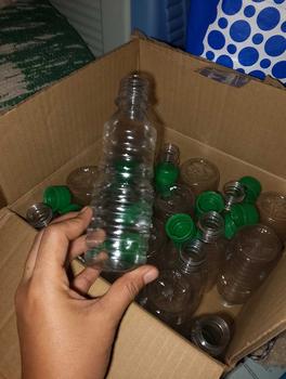 Product Review of Pet Bottle with COLOR Caps 250 ml - 20 PCS GREEN, YELLOW, BLUE, RED for Mineral Water, Juice, Dishwashing Liquid, Soy Sauce from J**e s**p 0