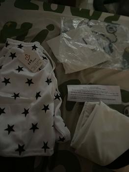 Product Review of Bộ quần áo màu trắng- áo hai tia sét + quần hoạ tiết ngôi sao HT: 29 Menswear Nam from ** 0