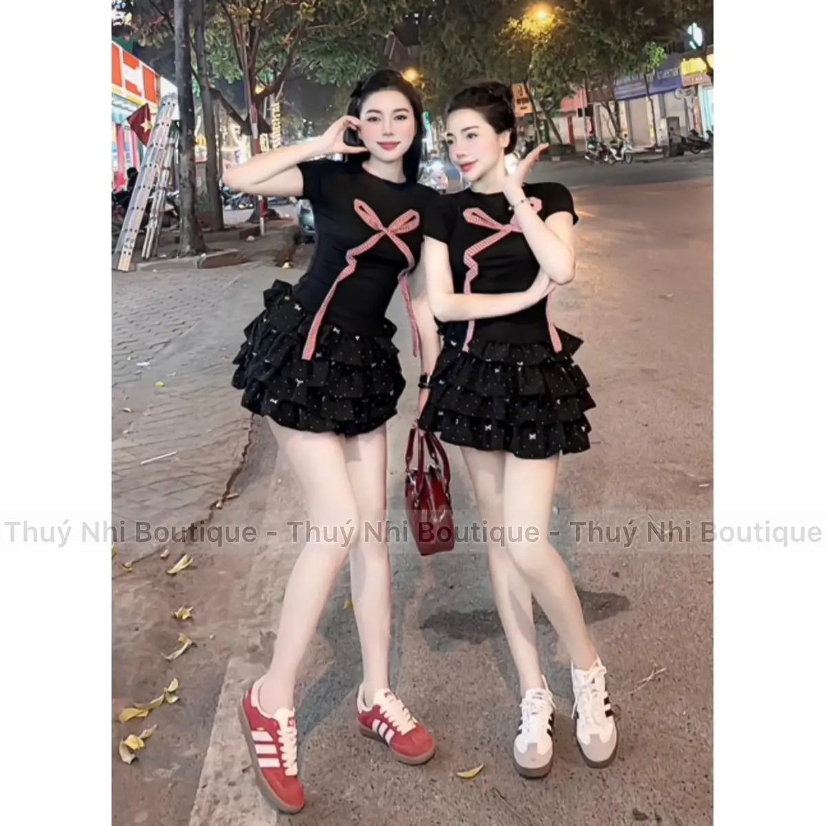 SET ÁO ĐÍNH NƠ PHỐI CHÂN VÁY TẦNG HOẠ TIẾT