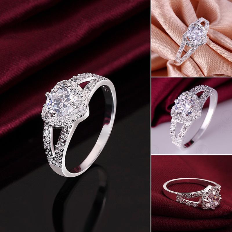 Product Introduction of Fashion Heart-Shaped Ring Hot Sale Ring Silver Plated Women's Ring European and American Zircon Gift All-Match Earrings 3
