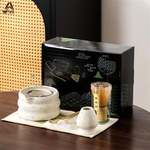 ชุดมัทฉะเซรามิกสไตล์ญี่ปุ่น AiyoCha พร้อมลายทราย 7/4 ชิ้น รวมตะกร้อไม้ไผ่แท้ 100 ชิ้น และที่กรองผงชา ชุดต้มชา Matcha สมบูรณ์แบบ สวยงาม และอินสตาแกรม เหมาะสำหรับใช้ในบ้านและของขวัญวันสำคัญ matcha  set  kit