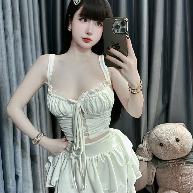 Sét áo 2 dây đan dây ngực mixx chân váy tầng điệu