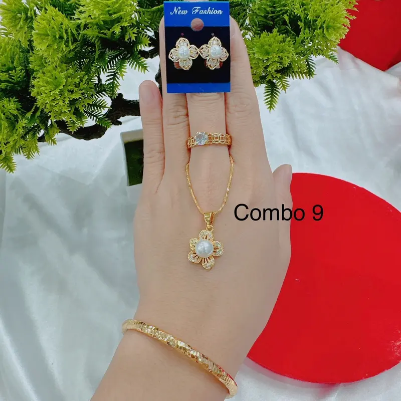 Bộ dây chuyền 4 món dây lắc nhẫn và bông tai( phụ nữ) Cao Su 3