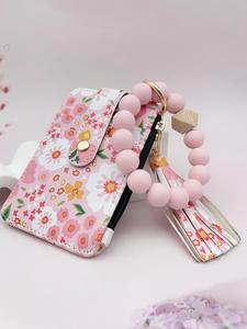 女性の自由奔放なスタイルのビーズとタッセルで飾られたキーホルダー、花柄の財布、ガールフレンドギフト、かわいいトレンディなキーホルダー、キー&バッグの装飾のためのシックなゴージャスなキーホルダー