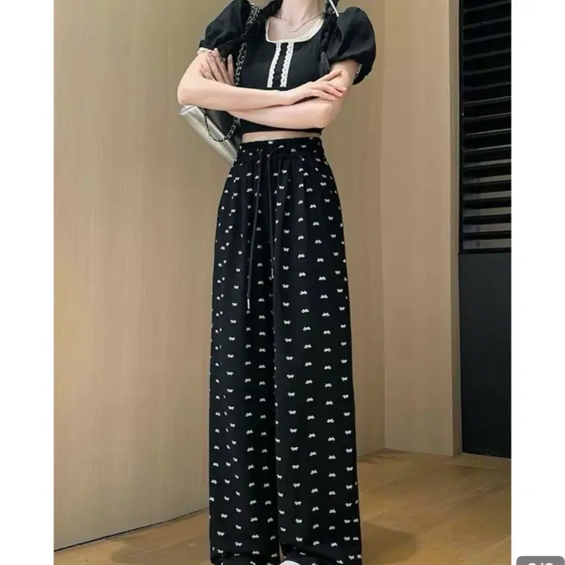 Quần ống suông Nữ họa tiết Nơ,Hello kitty chất vải Da Cá Tàu co giãn đẹp. 2