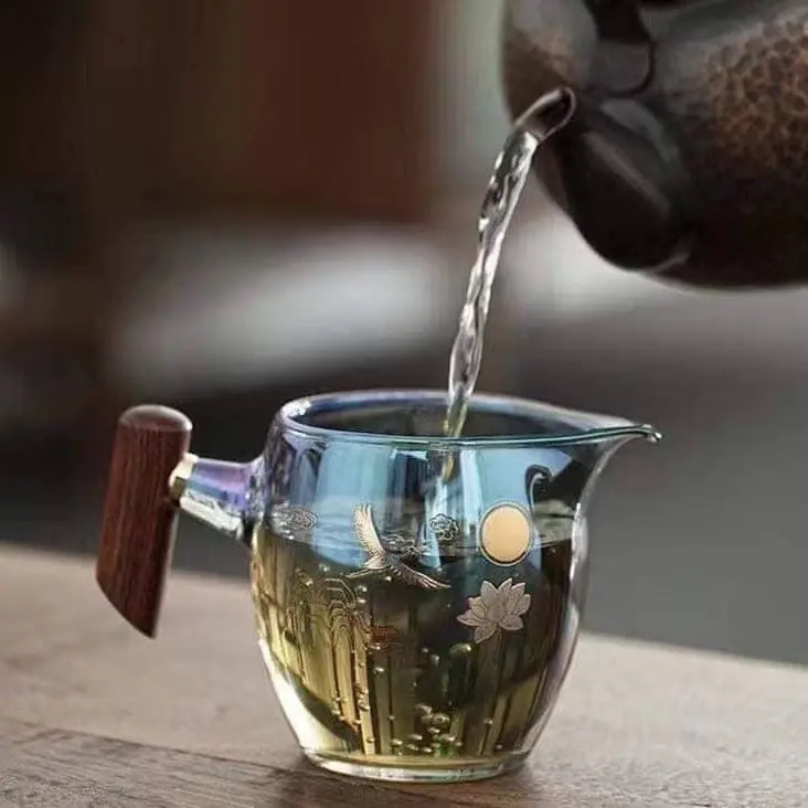 Tống trà thuỷ tinh cán gỗ