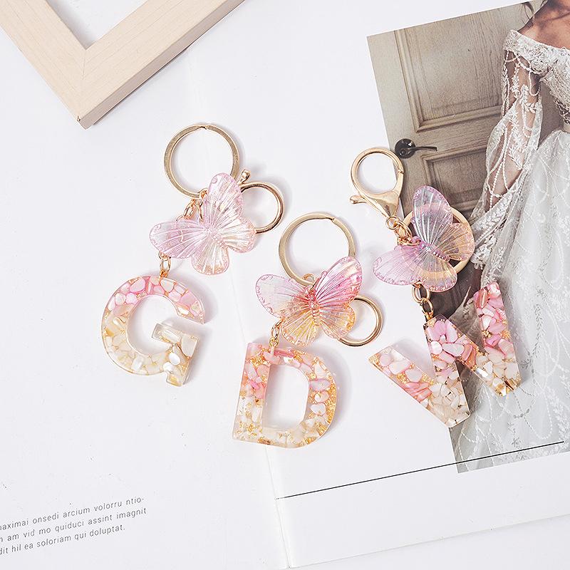 Product Introduction of [QQQ]Pink Dream Butterfly 26 Letters A To Z Resin Keychain 26 Initials White Stone  Leaf Pendant Keyring Backpack Charm Bag Decor 17