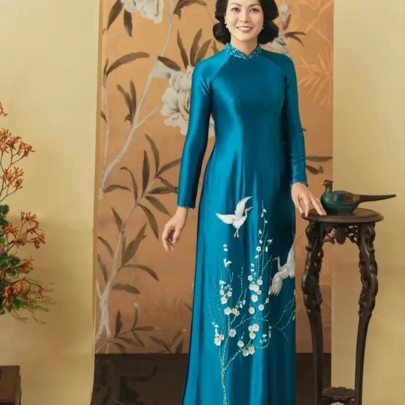 ÁO DÀI RUBY CỔ VỊT THÊU CHIM TUYẾT MAI