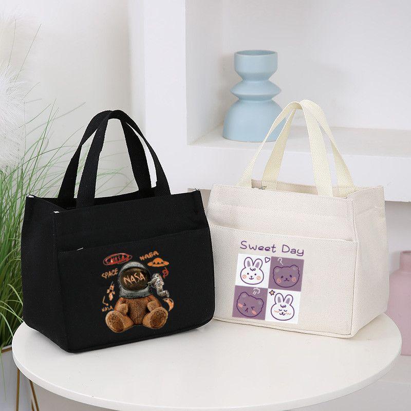 Product Introduction of New Canvas Handbag Large Capacity Simple Office Worker Student All-Match Lunch Box Mummy Work Bento Canvas Bag 3
