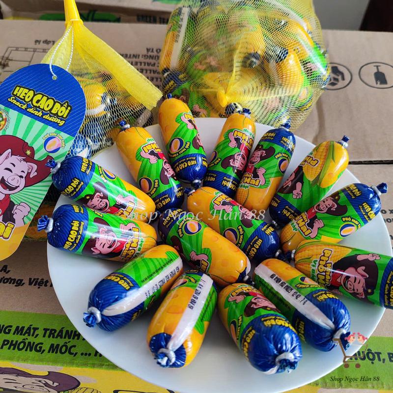 Xúc xích Heo cao bồi Nhân phô mai vị bắp túi lưới 15 cây x 32g