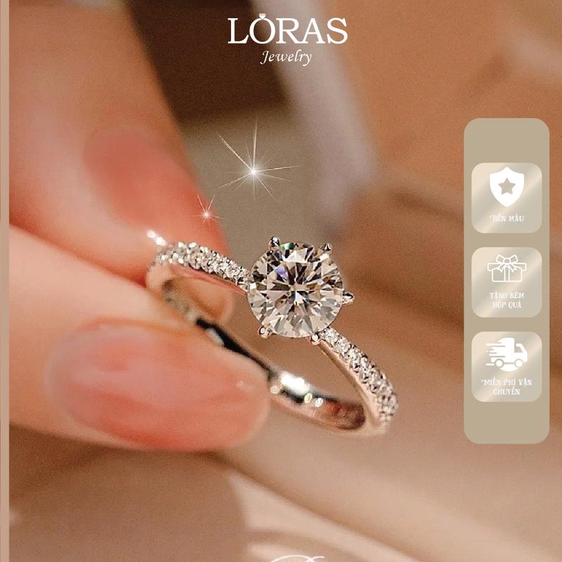 Nhẫn nữ hở đính đá tròn, khảm đá cao cấp sáng lấp lánh. Hợp kim titan bền màu, không gỉ, không gây kích ứng. Thiết kế tinh tế, dễ điều chỉnh theo ngón tay. NHH_01 LORAS JEWELRY