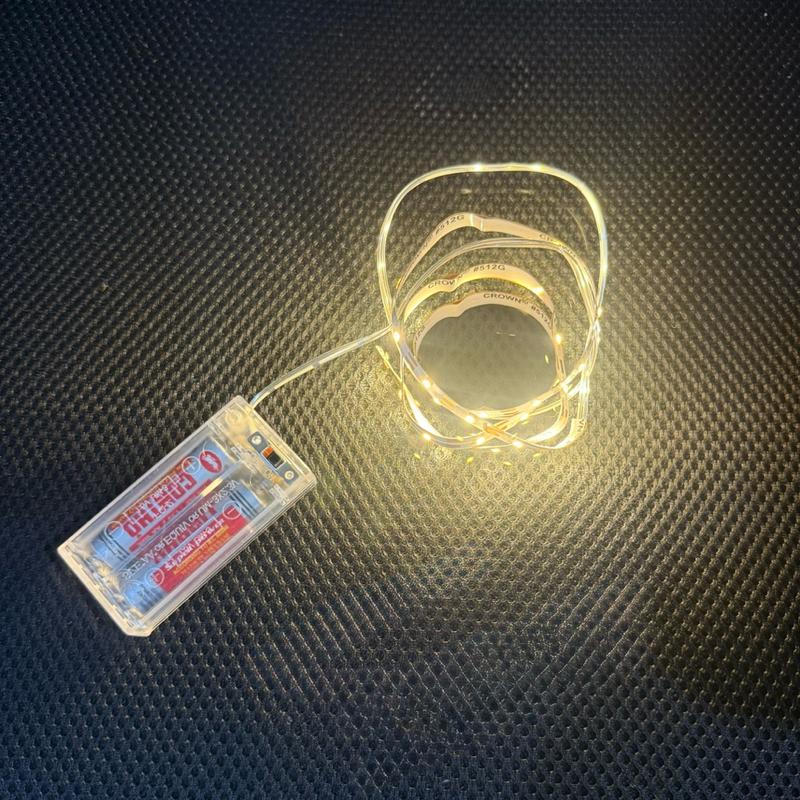 Đèn led dây dài 50cm rộng 5mm 3V màu vàng nhẹ có băng dính sẵn, sẵn pin - S1001
