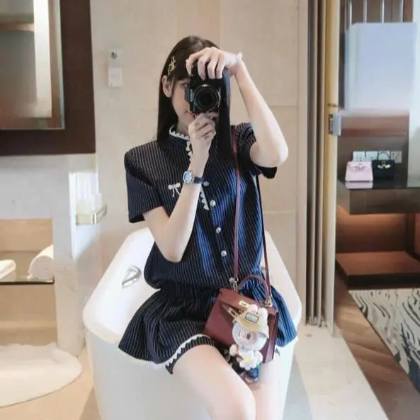 Jum kẻ xanh viền ren túi nơ thêu 0