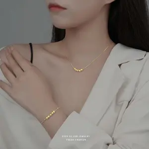 Set Perhiasan 18K  Kalung + Gelang “Lima Berkah” Elegan