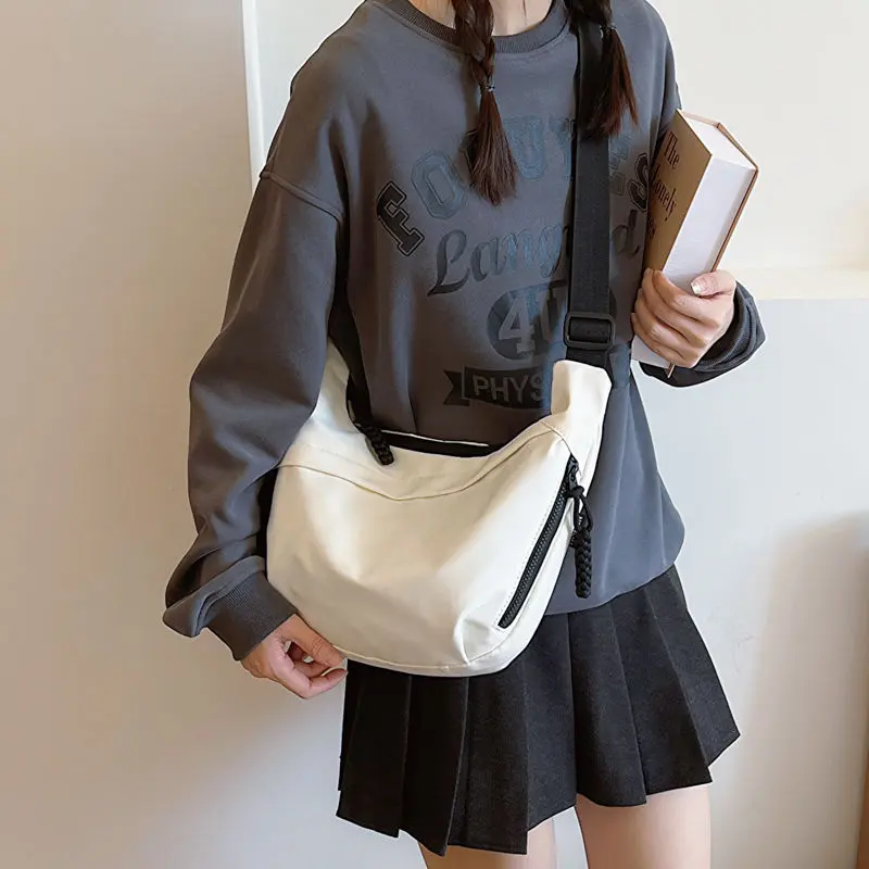New Special-Interest Design Bag Women's Large Capacity 2025 Spring and Autumn Canvas Shoulder Messenger Bag Popular Commuter Dumpling Bag