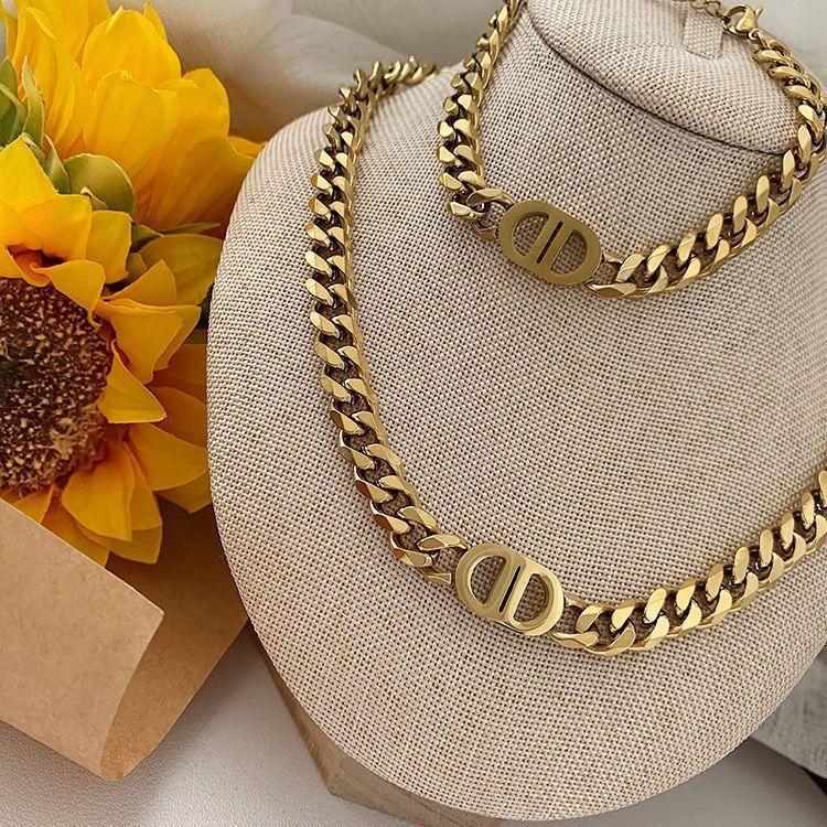 Product Introduction of Gold Thick Straps Pairs Letter D Necklace Hip Hop Cool Short Clavicle Chain All-Match Men's and Women's Same Bracelet Earrings Necklace Cuban Necklace 4