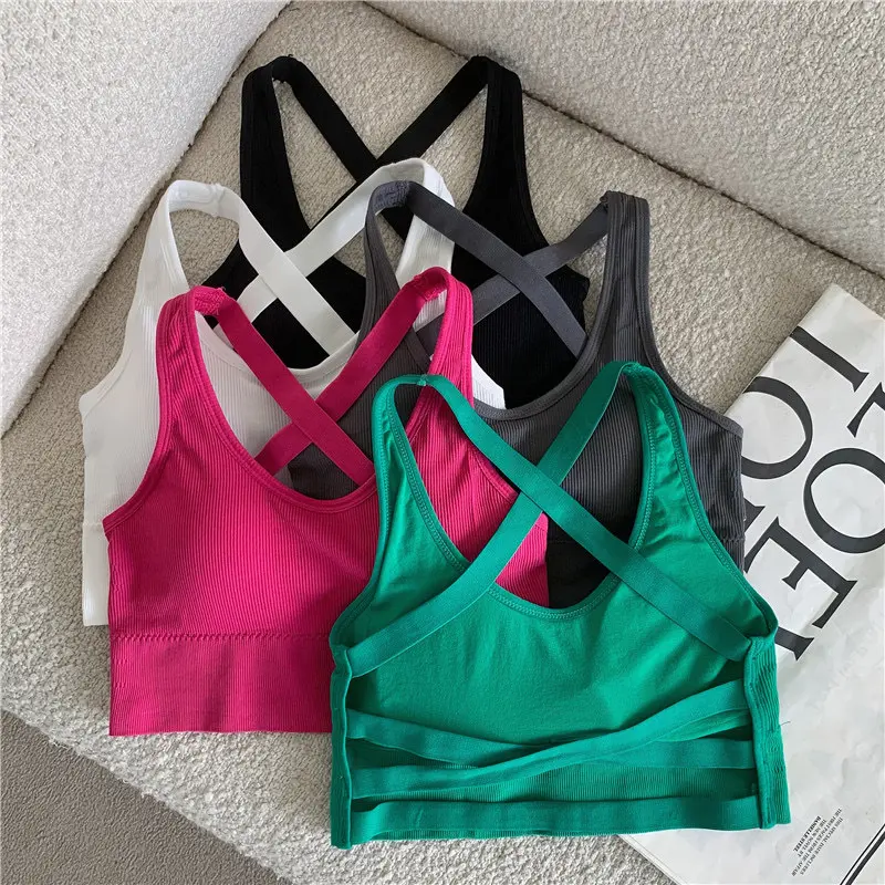 Seamless stretch crop top for women, perfect for summer.This trendy, sexy piece can be worn as an inner layer or as a stylish outerwear.Features cross-back straps and built-in padding for added support and a fashionable look.