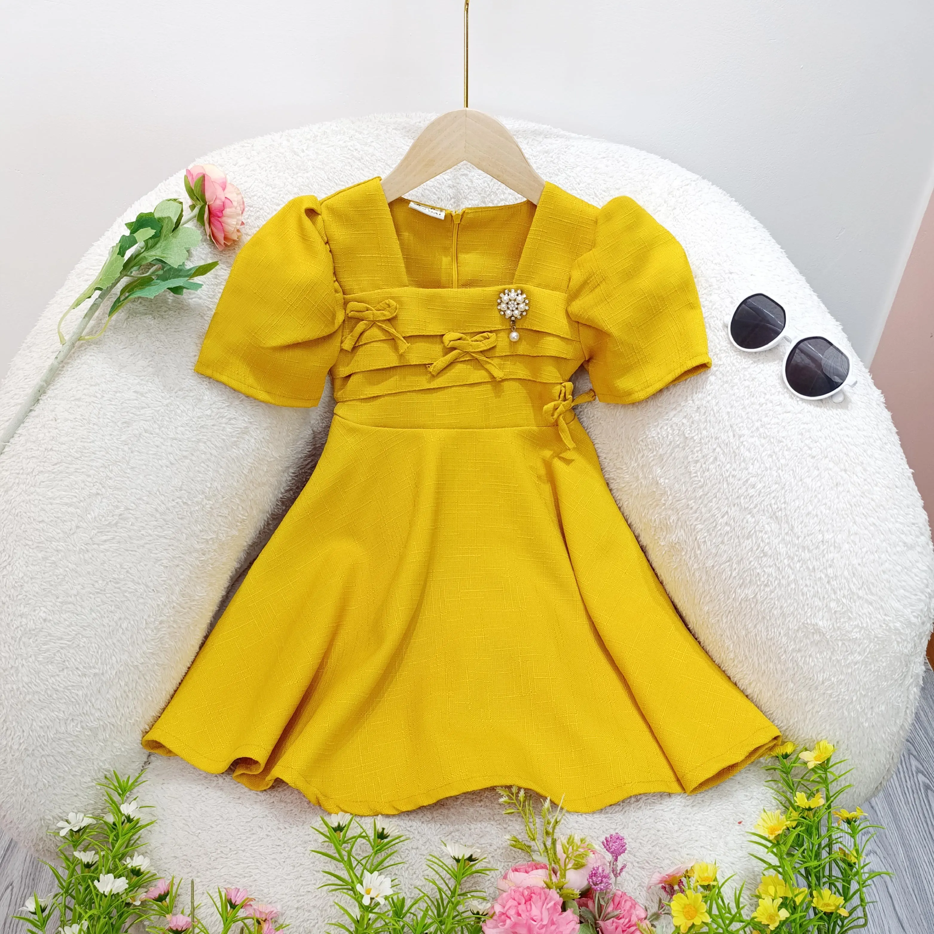 Váy đầm dự tiệc cho bé gái SuSu Kids đính nơ xếp ngực SU379