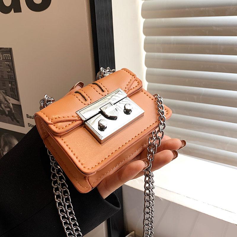 Cute small designer bags hotsell