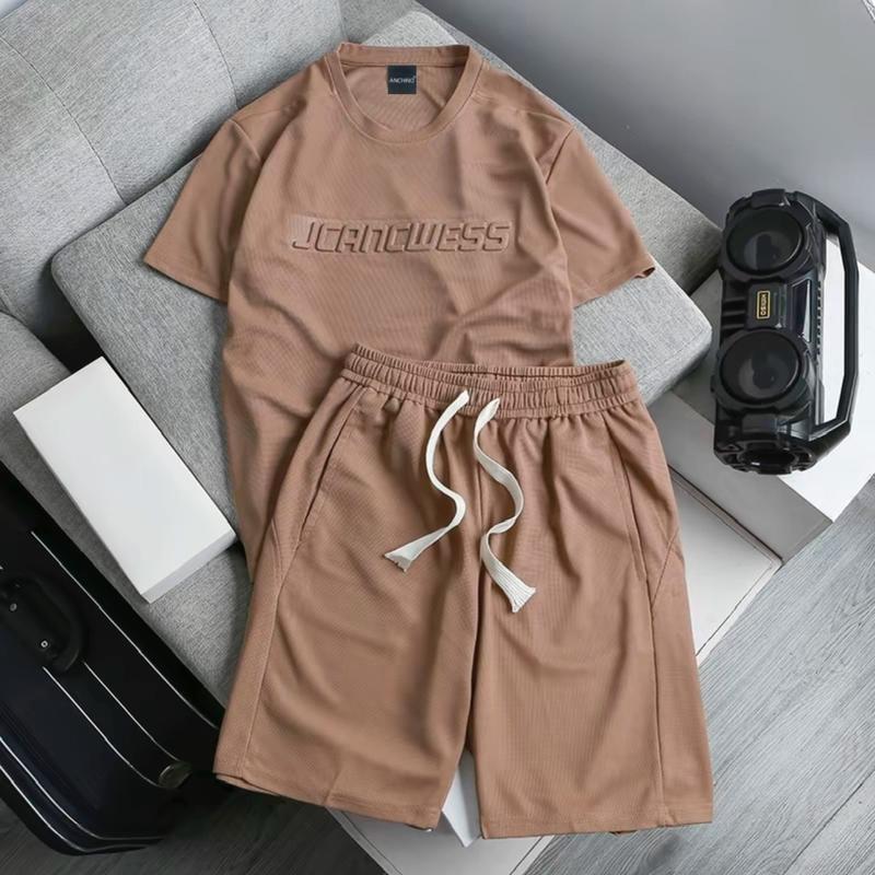 Bộ quần áo nam nữ cổ tròn cộc tay vải tổ ong thoáng mát, chữ JCANCWESS dập nổi cao cấp