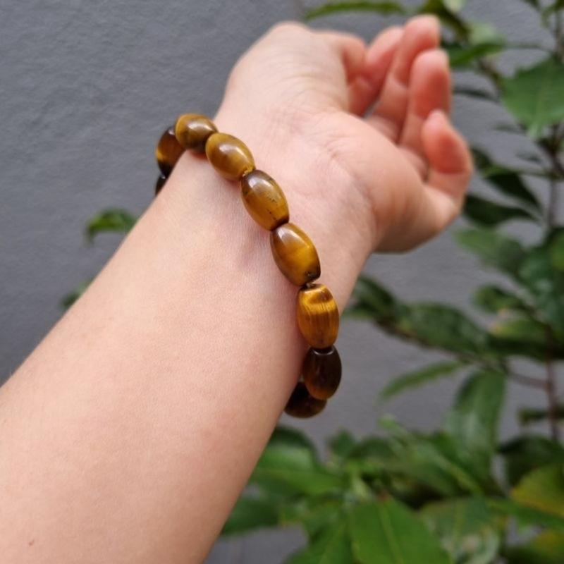 Vòng tay lu thống màu vàng nâu M.Hổ size 8 li 1