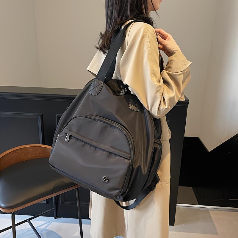 Product Introduction of Large Capacity Commuting Travel Shoulder Bag Fashionable Versatile Backpack Parent Bag Women's Casual Bag Oxford Cloth Handbag Adjustable Strap Zipper Closure 1