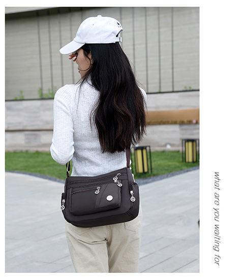 Product Introduction of Women's Bag Mother's Bag New 2025 Middle-Aged Women's Bag Nylon Canvas Bag Waterproof Multi-Layer Shoulder Messenger Bag 33