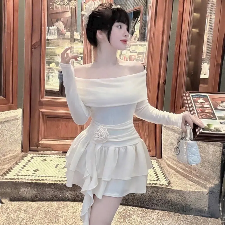 VÁY XÒE TẦNG TRỄ VAI TAY DÀI ĐÍNH HOA TUA RUA EO (Có kèm quần)