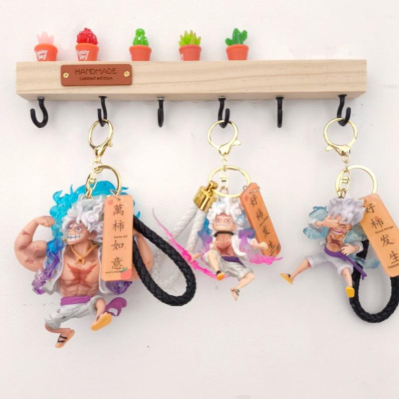 Product Introduction of Móc Chìa Khóa One Piece NICKA Luffy, Thiết Kế Vua Hàng Hải Bánh Răng Thứ Năm Mặt Dây Chuyền Cặp Sách Học Sinh Apollo, Quà Tặng Cho Bé Trai, Phụ Kiện Mặt Dây Chuyền Cá Tính Hoa Móc Khoá Nữ 1